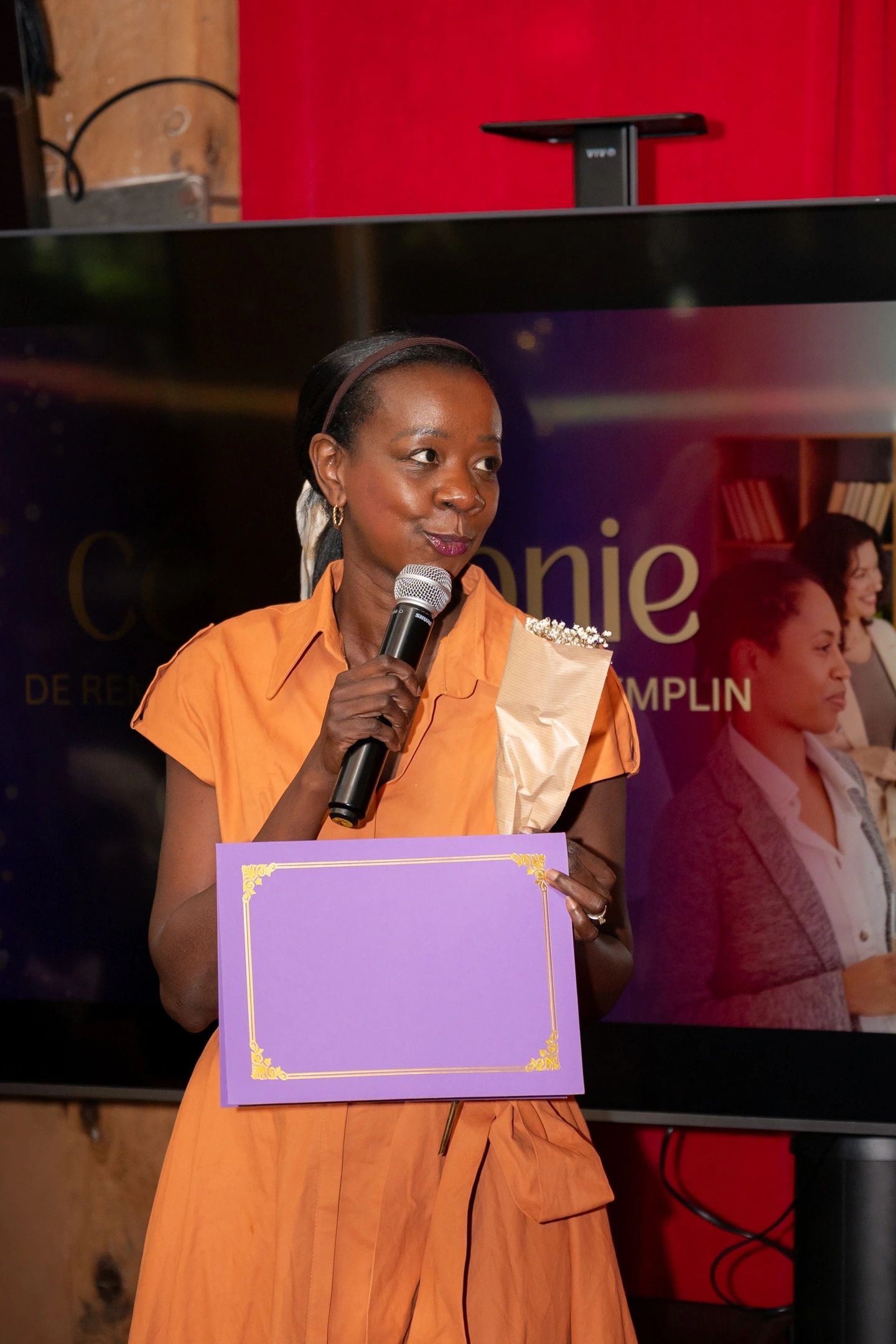 Samira Diallo speaking on stage